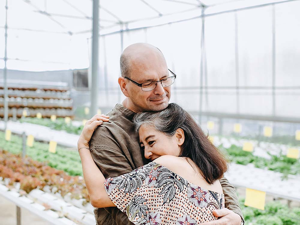 Image of couple hugging each other as they prepare for funeral planning services